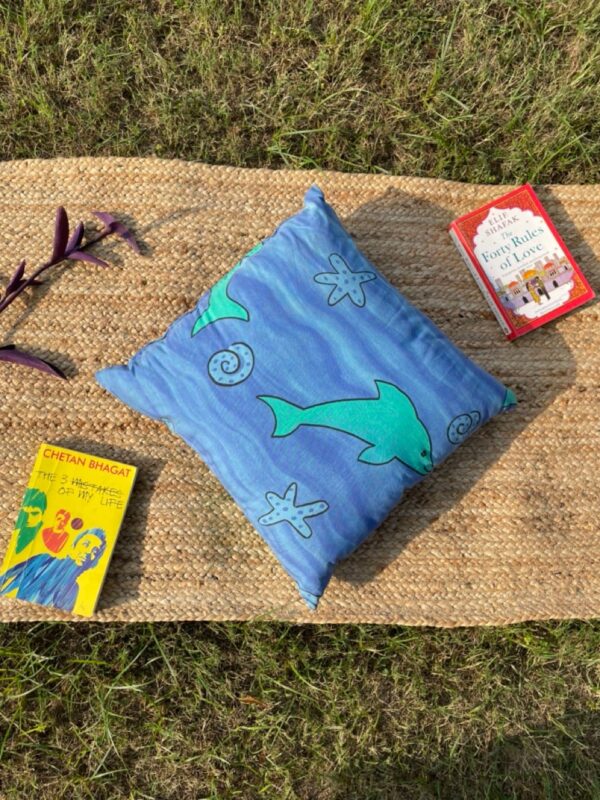 Upcycled cushion made from repurposed fabrics, eco-friendly and sustainable home décor accent piece.