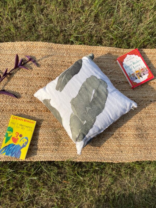 Upcycled cushion made from repurposed fabrics, eco-friendly and sustainable home décor accent piece.