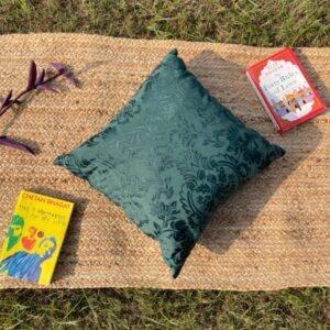 Upcycled cushion made from repurposed fabrics, eco-friendly and sustainable home décor accent piece.