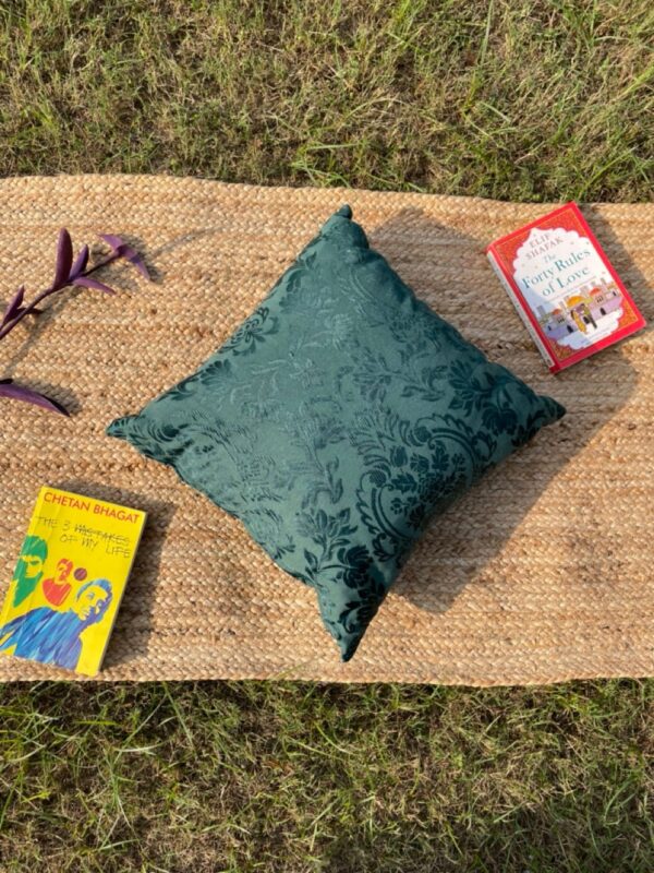 Upcycled cushion made from repurposed fabrics, eco-friendly and sustainable home décor accent piece.