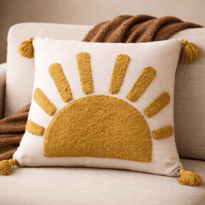 Handcrafted sustainable decorative cushion cover with textured botanical design placed on a neutral sofa in a modern earthy interior