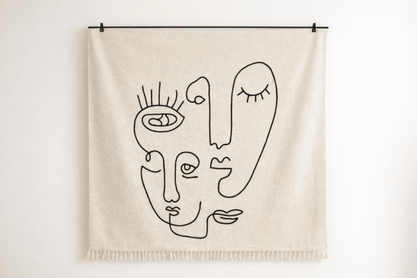 Handcrafted embroided decorative throw placed on a sofa