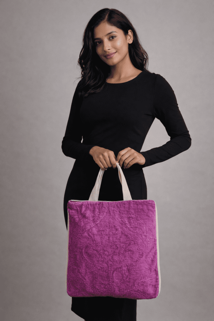 Sustainable woven tote bag by Respun with sturdy handles and secure zip closure